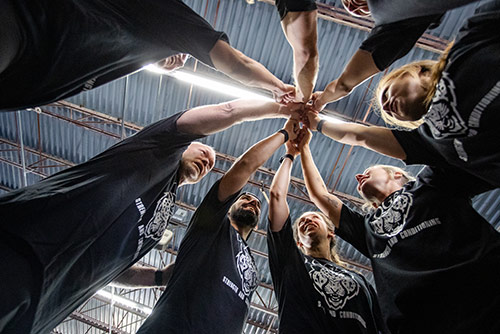 A group of students performing a team cheer